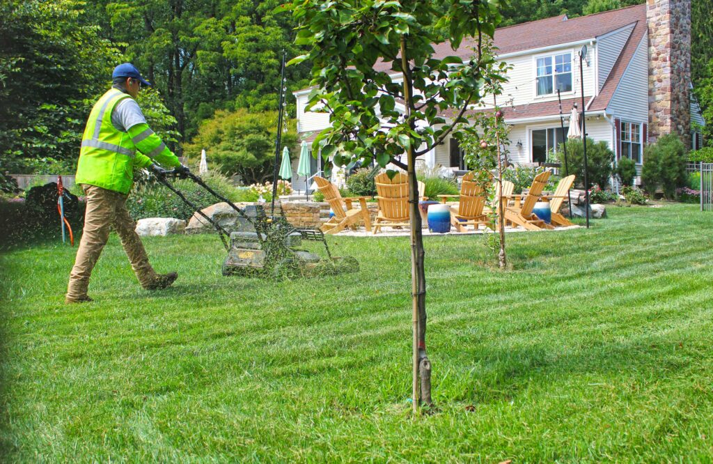 An lawn being worked on by Garret Churchill