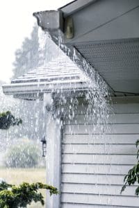 Water Overflowing Roof Gutters